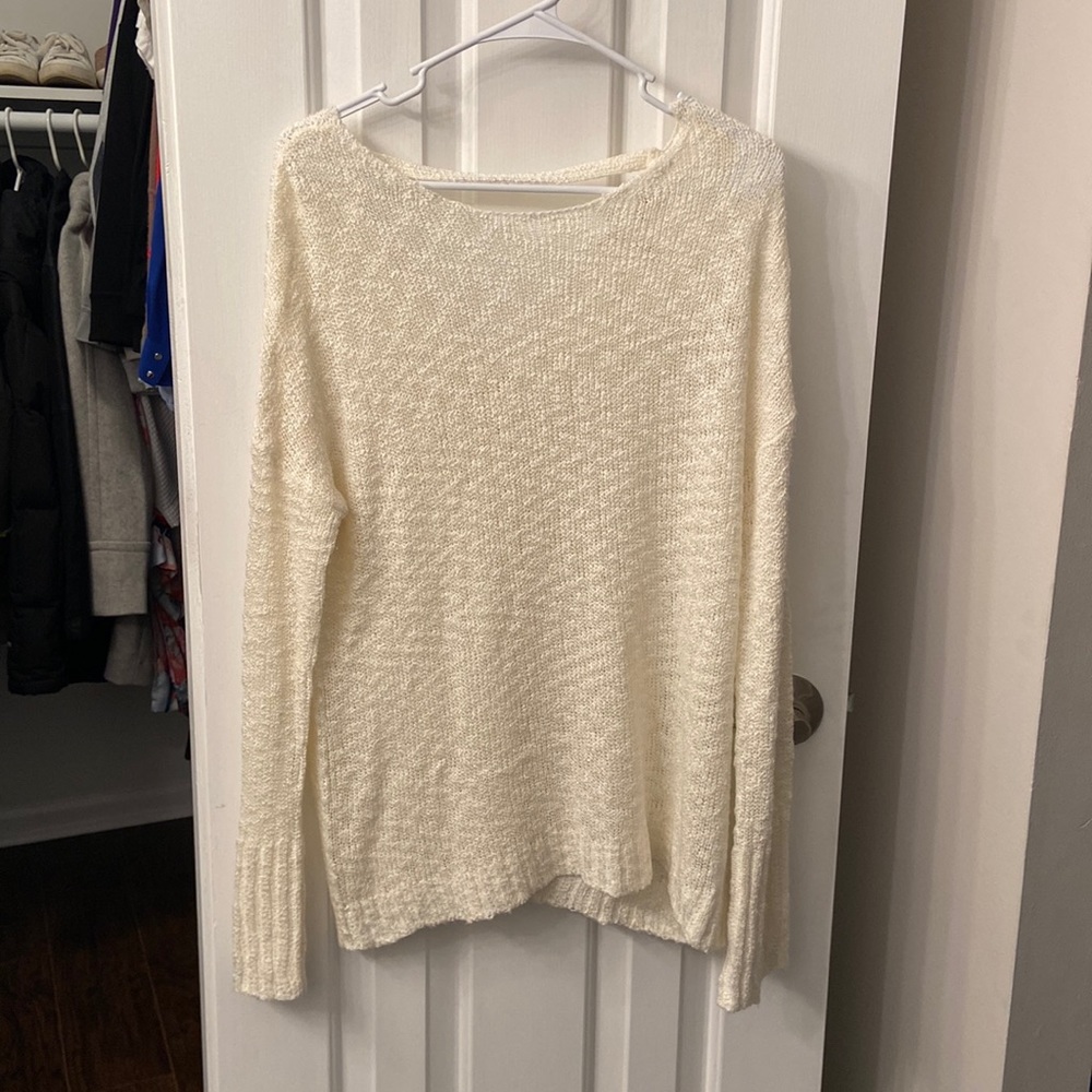 White sweater with back cutout and tie detail